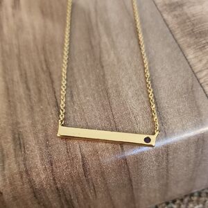 Elegant Gold Bar Necklace with Purple Accent